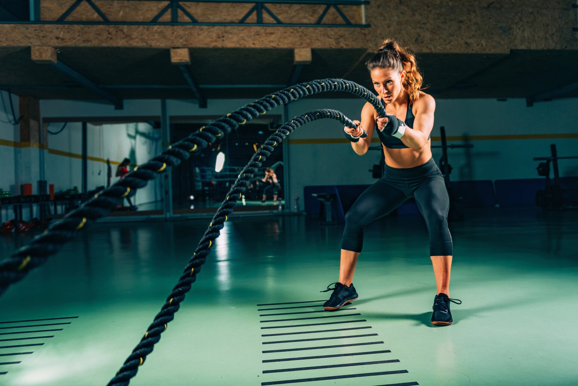 depositphotos 225187768 stock photo cross training woman doing rope